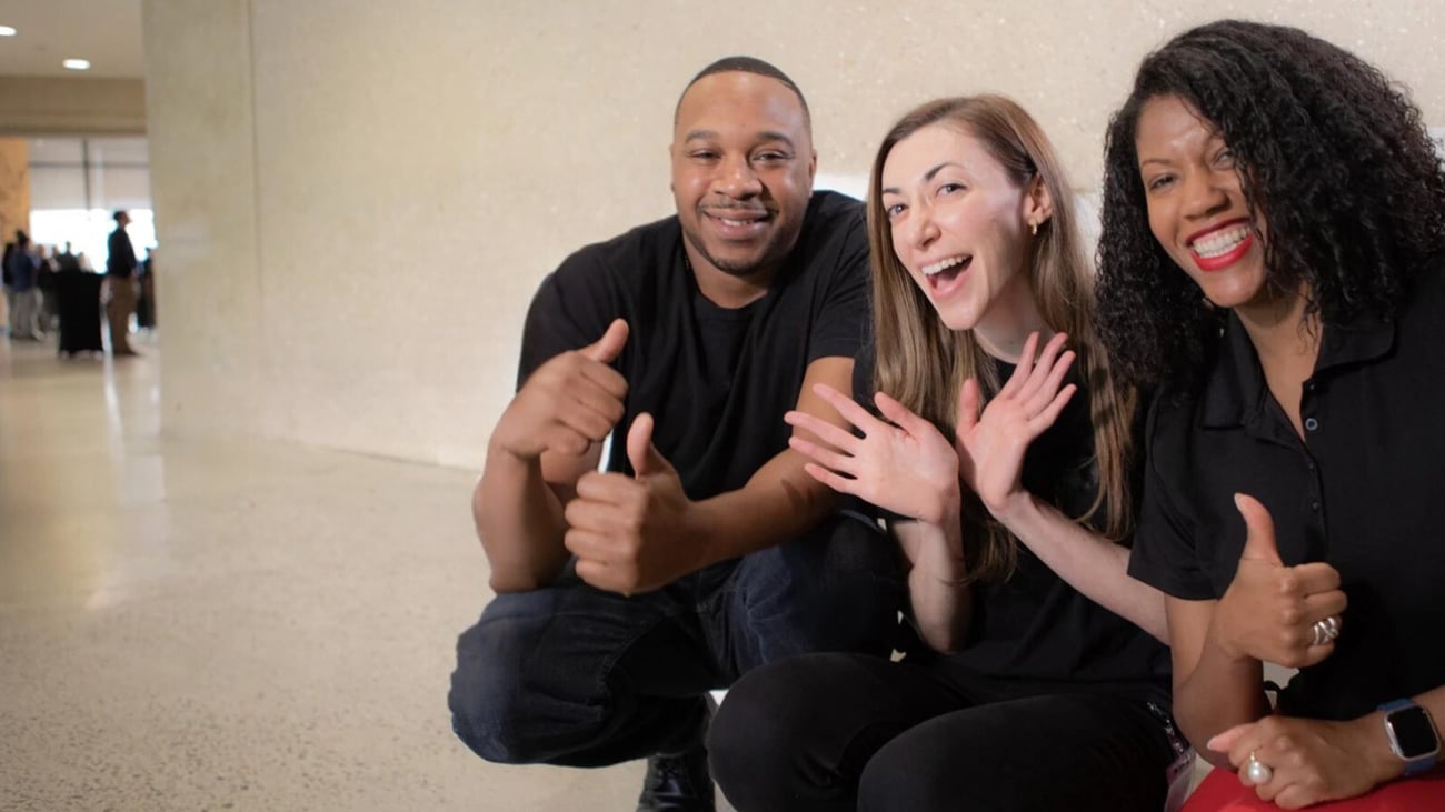 a group of people sitting on the floor